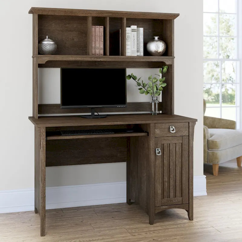 Petit bureau d'ordinateur avec étagère de rangement sur le dessus