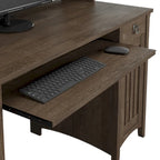 Petit bureau d'ordinateur avec étagère de rangement sur le dessus