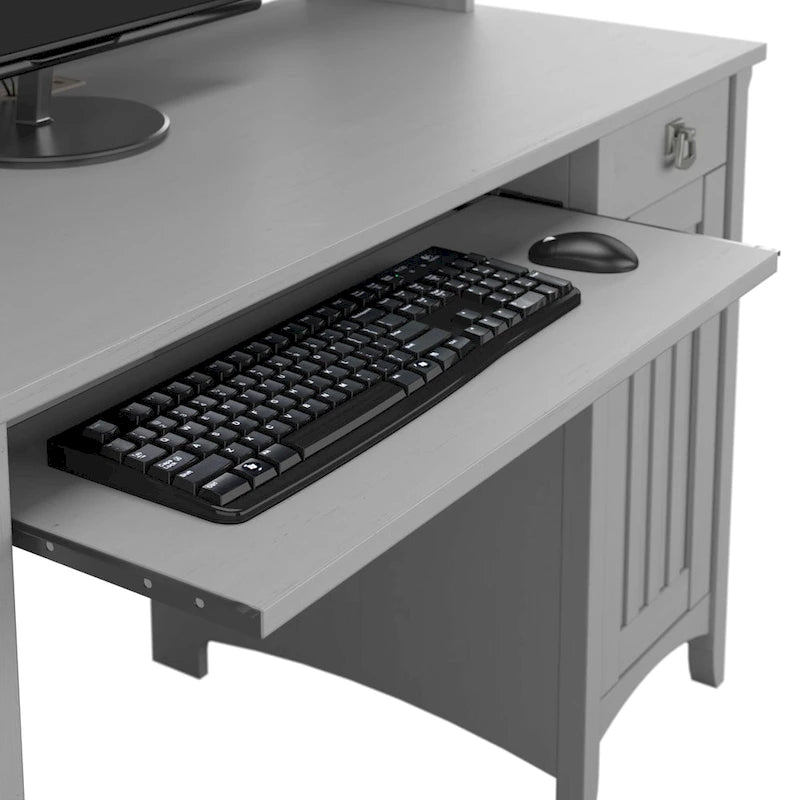 Petit bureau d'ordinateur avec étagère de rangement sur le dessus