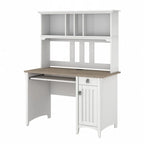 Petit bureau d'ordinateur avec étagère de rangement sur le dessus