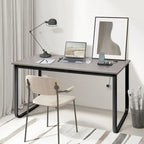 Bureau d'ordinateur moderne en métal noir avec étagères de rangement pour usage personnel